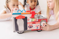 
              Camión de rescate de madera de Marshall Melissa & Doug
            